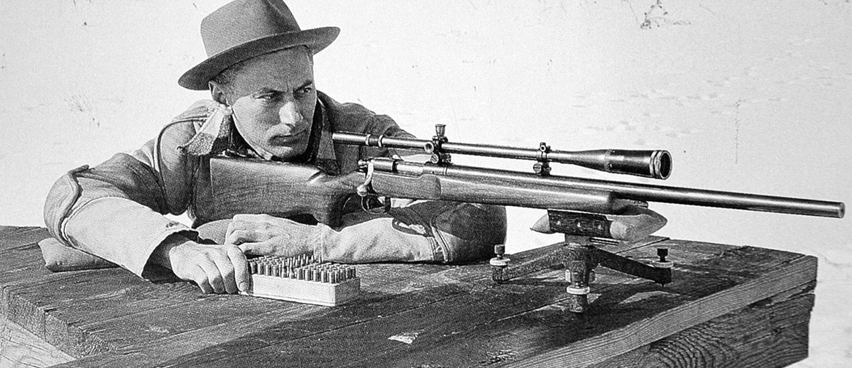 In this early 1950s photo, Remington engineer Mike Walker is shooting a benchrest rifle built by him around a Model 722 action. It was the forerunner of the 40X target rifle, also designed by Walker.  The Lyman Super Targetspot scope on the rifle was quite popular during the early days of modern benchrest competition.
